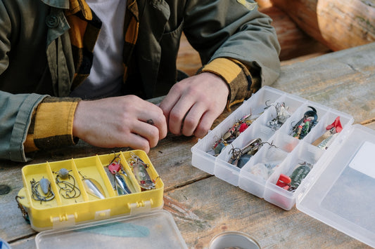 Man with tackle boxes